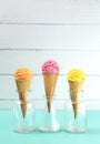 Orange Pink and Yellow Scoops of Ice Cream
