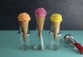 Orange Pink and Yellow Scoops of Ice Cream