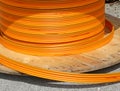 Orange pipes for fiber optic connection ADSL users Royalty Free Stock Photo