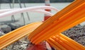 Orange pipes for fiber optics in a large city road construction Royalty Free Stock Photo