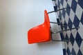 Orange plastic chair