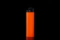 Orange plastic cigarette lighter on black background, closeup Royalty Free Stock Photo