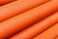 Orange plastic PVC pipes