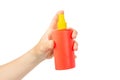 Orange plastic spray bottle isolated on white background. Royalty Free Stock Photo