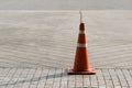 Orange Plastic traffic cone on the road Royalty Free Stock Photo