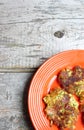 Orange Plate Of Cauliflower And Broccoli Pancakes