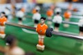Orange pleyer in table football Royalty Free Stock Photo