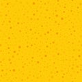 Orange polka dots seamless pattern on yellow.