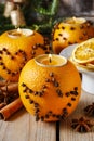 Orange pomander ball with candle, christmas decoration Royalty Free Stock Photo