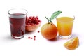 Glass of orange juice and pomegranate juice Royalty Free Stock Photo