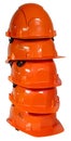 Orange protective helmet on a white background. Construction helmet. A stack of several helmets