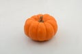 Orange pumkin on white background Royalty Free Stock Photo