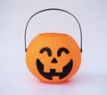 Orange pumpkin face smile on white background, symbol halloween