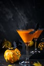 Orange pumpkin, Halloween drink for party and holiday decorations over black background with  copy space Royalty Free Stock Photo