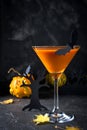 Orange pumpkin, Halloween drink for party and holiday decorations over black background . copy space Royalty Free Stock Photo