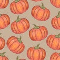 Orange pumpkins isolated on beige background. Seamless pattern. Halloween or Thanksgiving Day decoration. Hand drawn illustration. Royalty Free Stock Photo