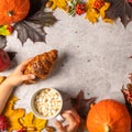 Orange pumpkins and red apples on autumn foliage Royalty Free Stock Photo