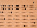 orange punched card for programming Royalty Free Stock Photo