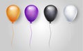 Orange, purple, black, and white balloons. Halloween decor.