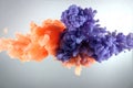 Orange and purple paint splash isolated on white background Royalty Free Stock Photo