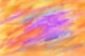 Orange and purple watercolor blur abstract painted canvas and paintbrush artistic