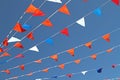 Orange, red, blue and white flags