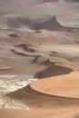 Orange and red-brown sand dunes near Deadvlei in the Namib-Naukluft National Park, Namibia Royalty Free Stock Photo