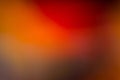 Orange, red and brown smooth and blurred wallpaper / Background Royalty Free Stock Photo