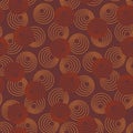 Concentric circles with dotted outline in two colors. Seamless geometric pattern on brown background. Vector image Royalty Free Stock Photo