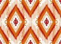 Orange and red Motif ethnic beautiful Ikat abstract yellow background Royalty Free Stock Photo