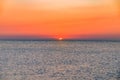 Orange red sunset sunrise on sea ocean horizon Royalty Free Stock Photo