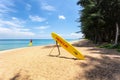 Orange rescue board and boundary flag on the beach at Mai Khao Beach, Phuket Province, Thailand Royalty Free Stock Photo