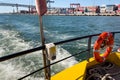 Orange rescue ring on a ferry boat in Lisbon