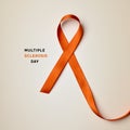 Orange ribbon and text multiple sclerosis day