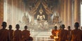 Orange-robed Buddhist monks practicing meditation in a temple. Silent contemplation in front of a Buddha effigy. Concept Royalty Free Stock Photo