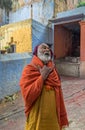 Orange-robed Sadhu Indian Monk Holy man inside Vintage Mataji or Devi