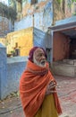 Orange-robed Sadhu Indian Monk Holy man inside Vintage Mataji or Devi