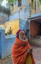 Orange-robed Sadhu Indian Monk Holy man inside Vintage Mataji or Devi