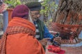 Orange-robed Sadhu Indian Monk Holy man inside Vintage Mataji