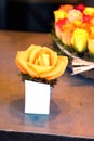 Orange rose bloom on a table Royalty Free Stock Photo