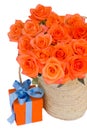 orange roses in basket with gift box Royalty Free Stock Photo