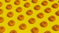 Orange round pumpkins yellow background, pattern with natural shadow. Top and side views, hard light. Creative concept Royalty Free Stock Photo