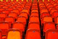 Bright orange rows of seats in the stadium Royalty Free Stock Photo