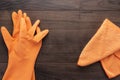 Orange rubber cleaning gloves Royalty Free Stock Photo