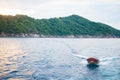 Orange rubber inflatable motor boat in the sea Royalty Free Stock Photo