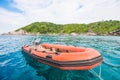 Orange rubber inflatable motor boat in the sea Royalty Free Stock Photo