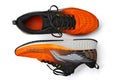 Orange running shoes isolated on white background. Shoes for walking, jogging, running, fitness, physical education