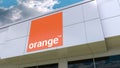 Orange S.A. logo on the modern building facade. Editorial 3D rendering