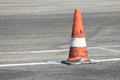 Orange safety cone on the track
