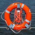 Orange safety ring and rope